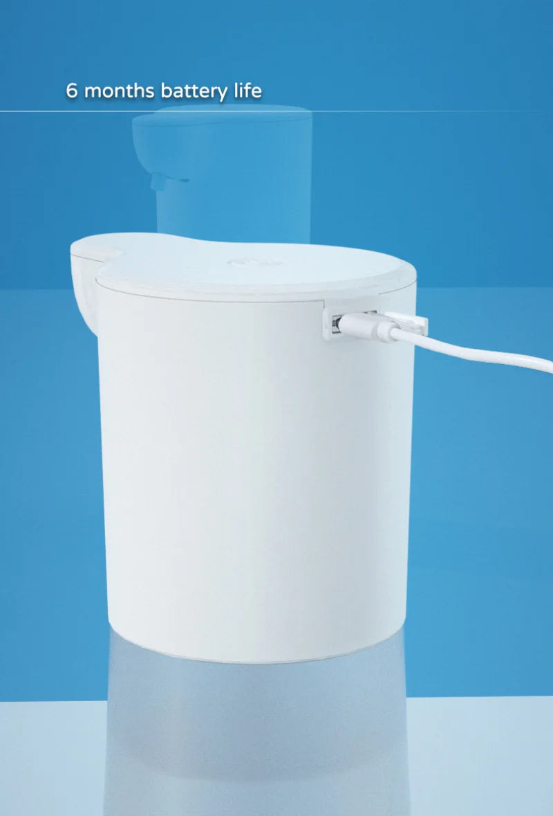 Xiaomi automatic touchless soap dispenser with infrared sensor on bathroom counter.