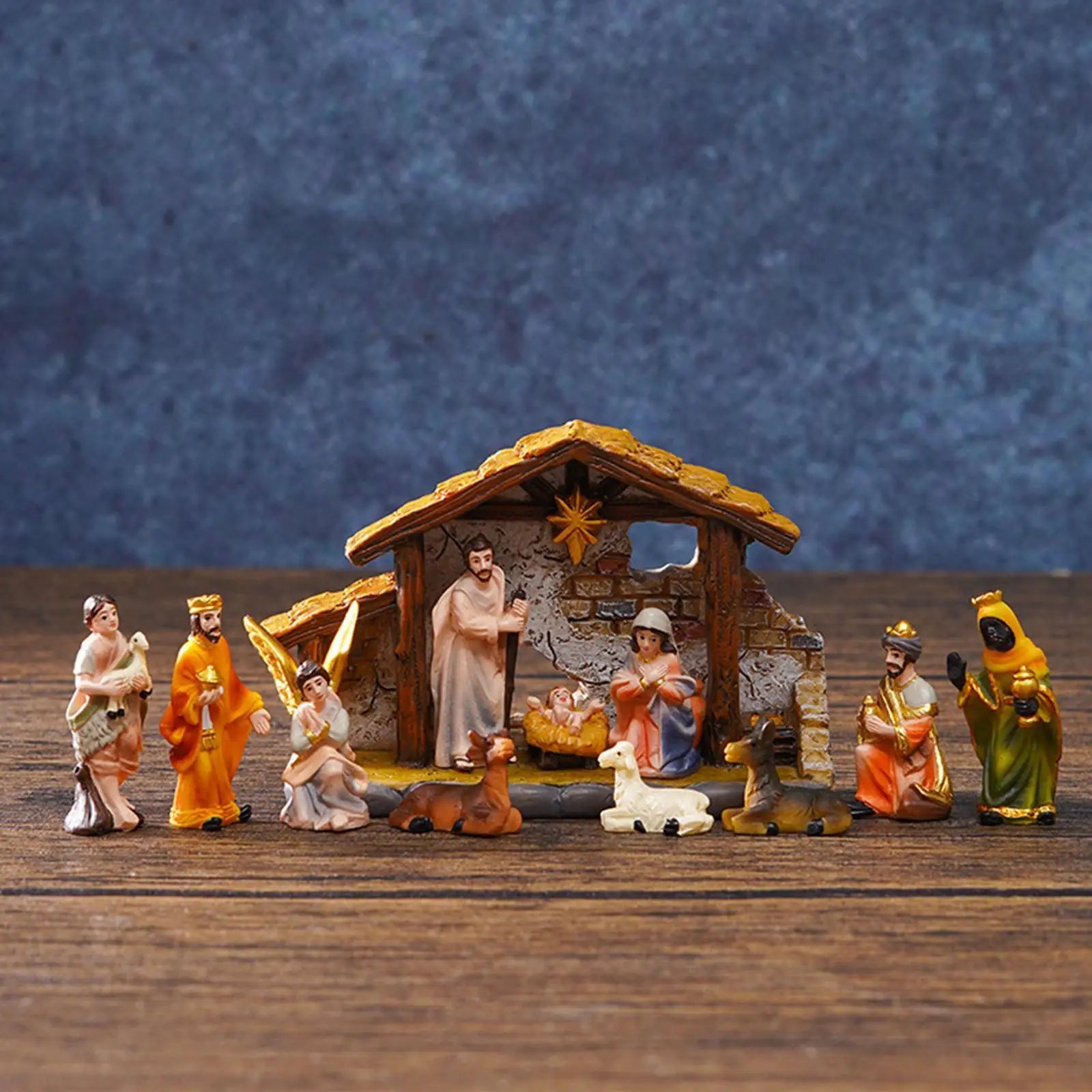 Handmade Christmas Nativity Scene Set featuring Holy Family statues and figurines.