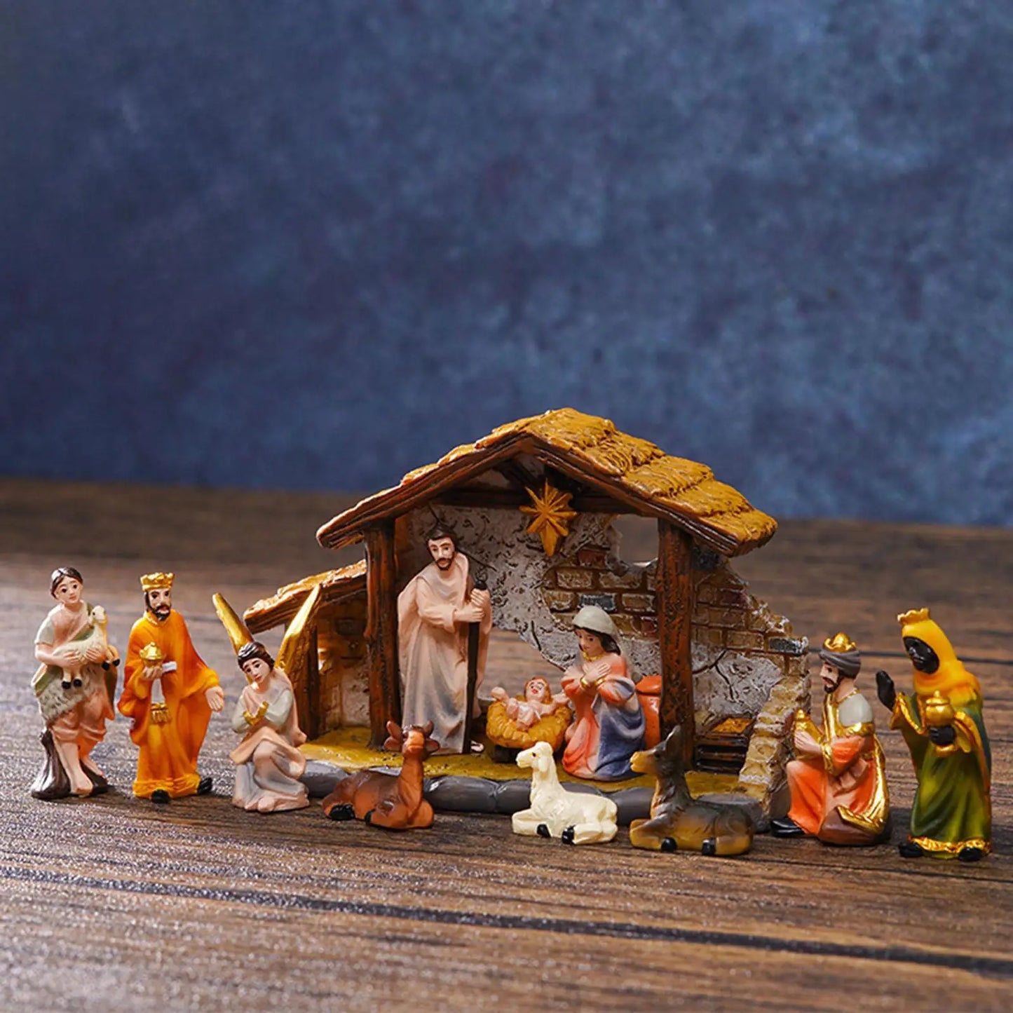 Handmade Christmas Nativity Scene Set featuring Holy Family statues and figurines.